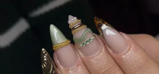 Intricate layered 3D nail art example by Leah